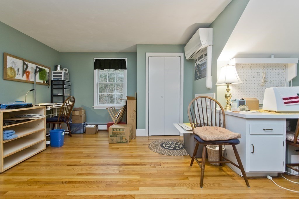 6 West Colonial Road Wilbraham, MA 01095 - Photo 23 of 34 a view of a workspace with furniture and a window