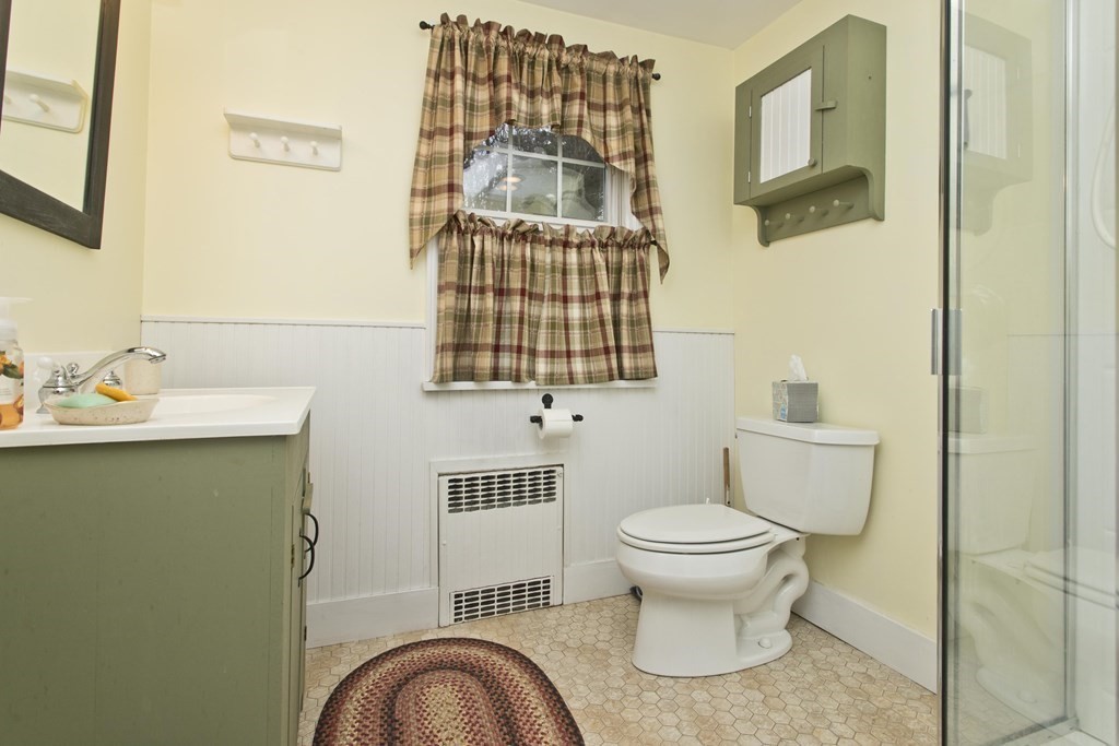 6 West Colonial Road Wilbraham, MA 01095 - Photo 29 of 34 a bathroom with a sink toilet and mirror