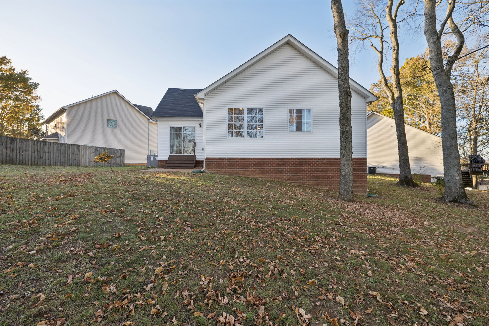 8010 Tiger Court Spring Hill, TN 37174 - Photo 35 of 36 a view of a house with a yard