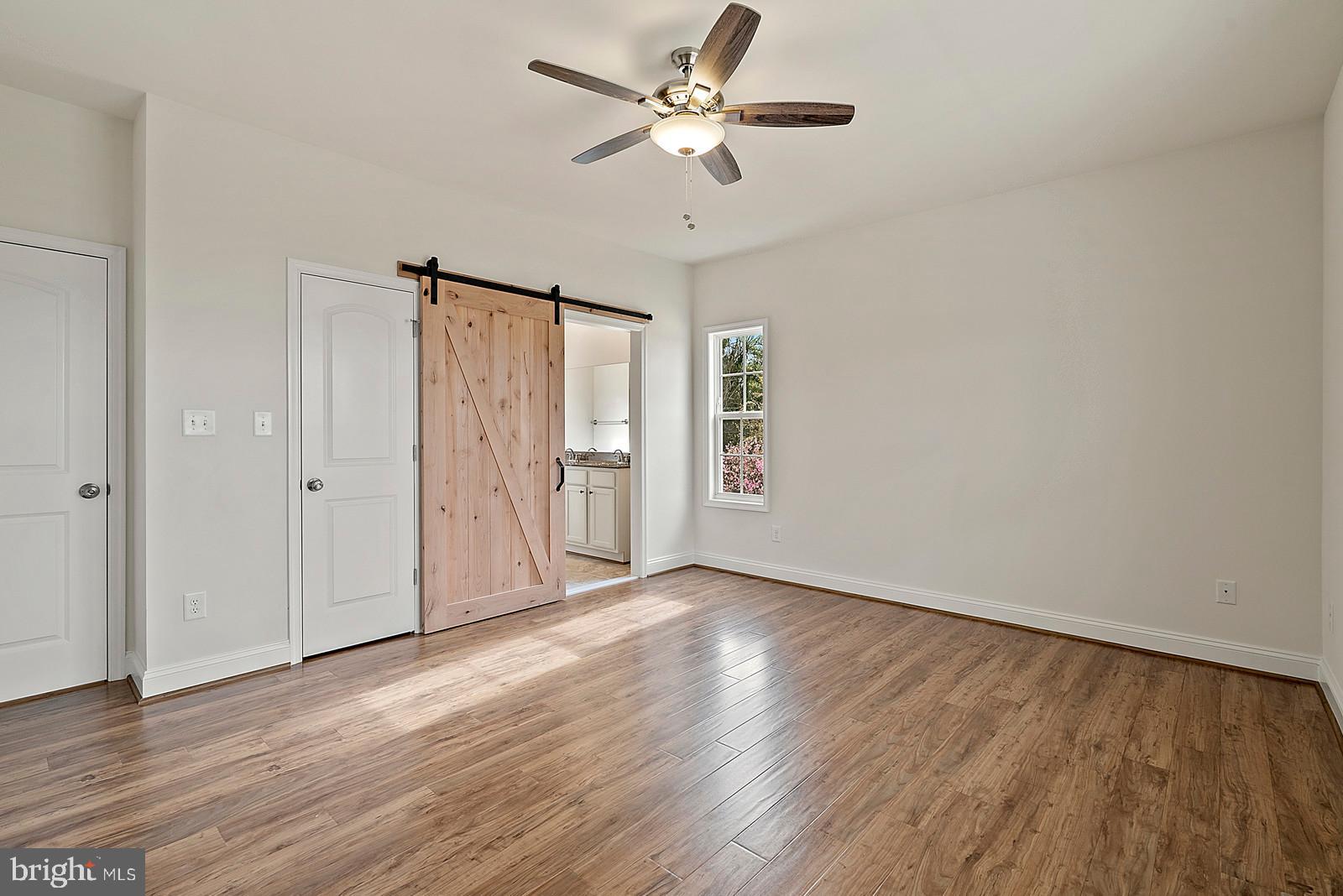 12020 Hume Road Hume, VA 22639 - Photo 15 of 38 Master Bedroom with Barn Door to Master Bath