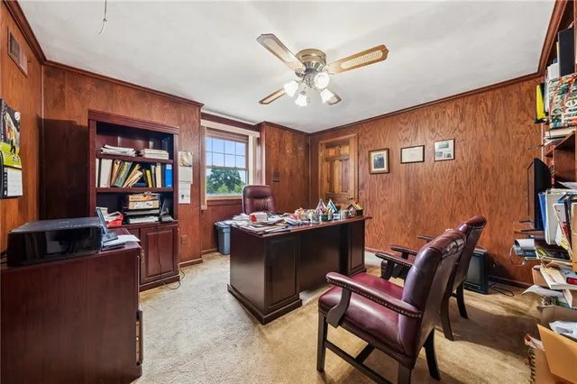 a view of a livingroom with furniture and window