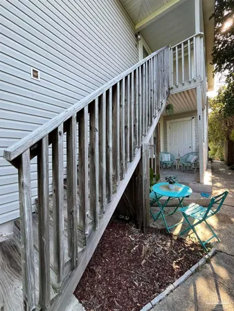 a stairs of a house with wooden floor