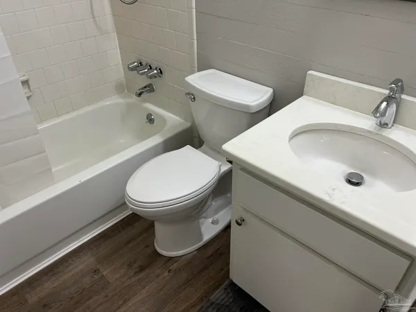 a bathroom with a sink and a toilet