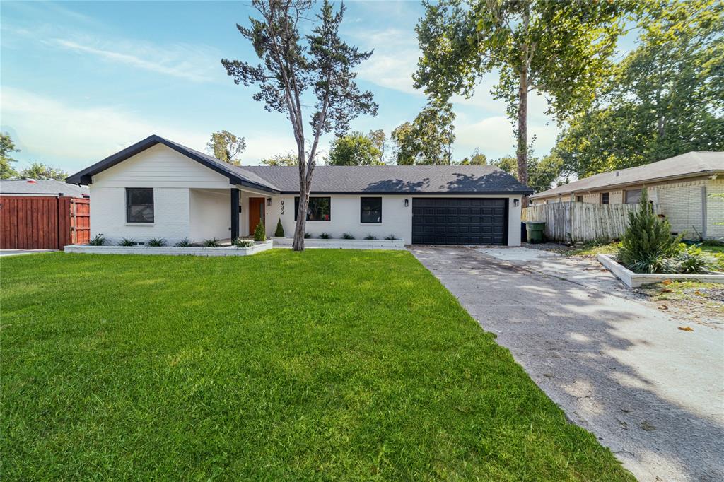 932 Treasure Road Garland, TX 75041 - Photo 1 of 28 Ranch-style home featuring concrete driveway, brick siding, a porch, and a garage
