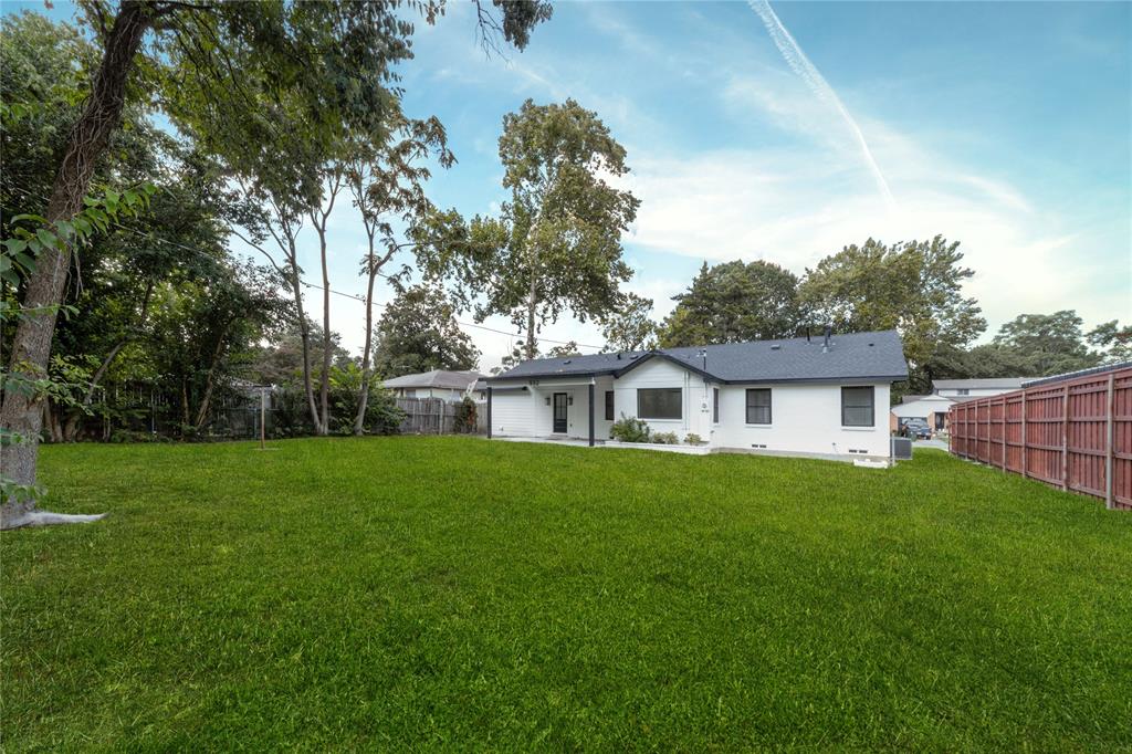 932 Treasure Road Garland, TX 75041 - Photo 27 of 28 Back of property featuring a patio and crawl space