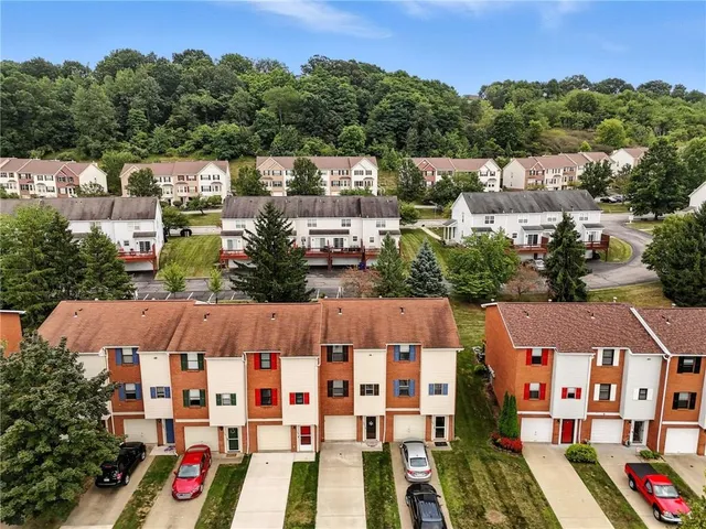 an aerial view of multiple house