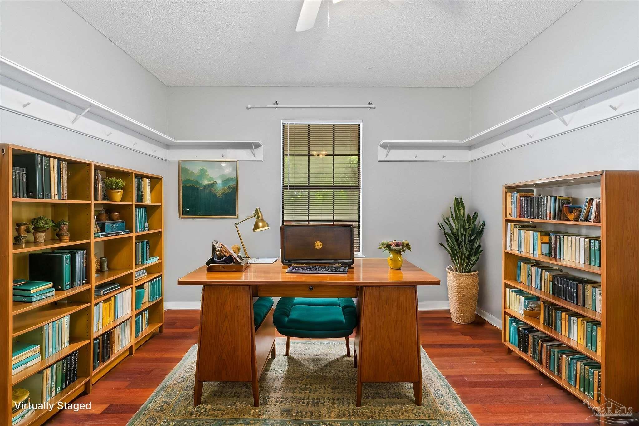 1151 Stone Bridge Road Pensacola, FL 32514 - Photo 29 of 52 a reading room with furniture window and book shelf