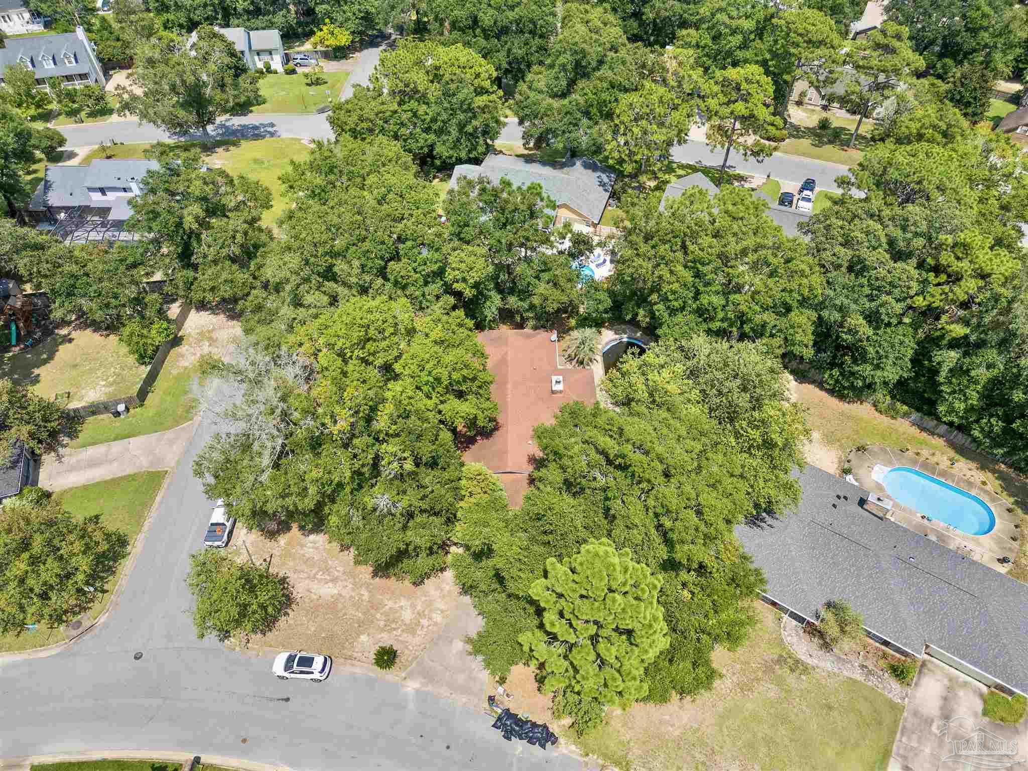 1151 Stone Bridge Road Pensacola, FL 32514 - Photo 41 of 52 an aerial view of a house with a yard and garden