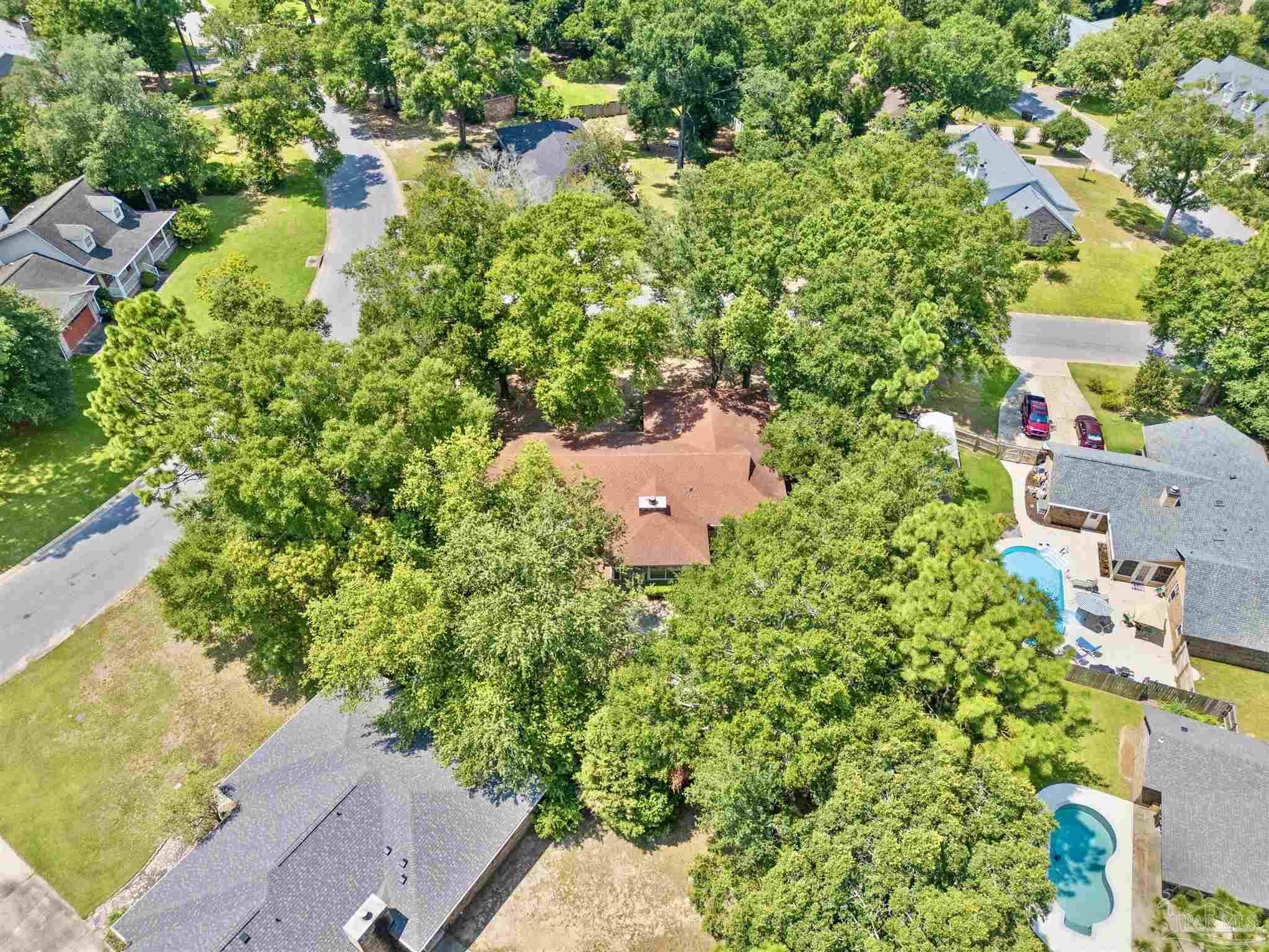 1151 Stone Bridge Road Pensacola, FL 32514 - Photo 43 of 52 an aerial view of residential house with outdoor space and trees all around
