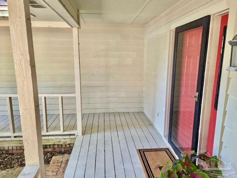 1151 Stone Bridge Road Pensacola, FL 32514 - Photo 48 of 52 a view of a wooden door