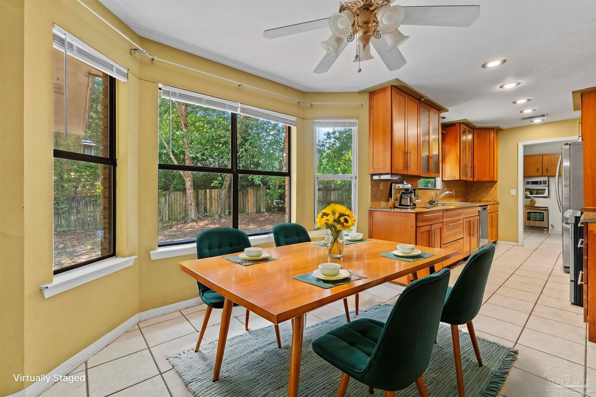 1151 Stone Bridge Road Pensacola, FL 32514 - Photo 5 of 52 a view of a dining room with furniture window and outside view