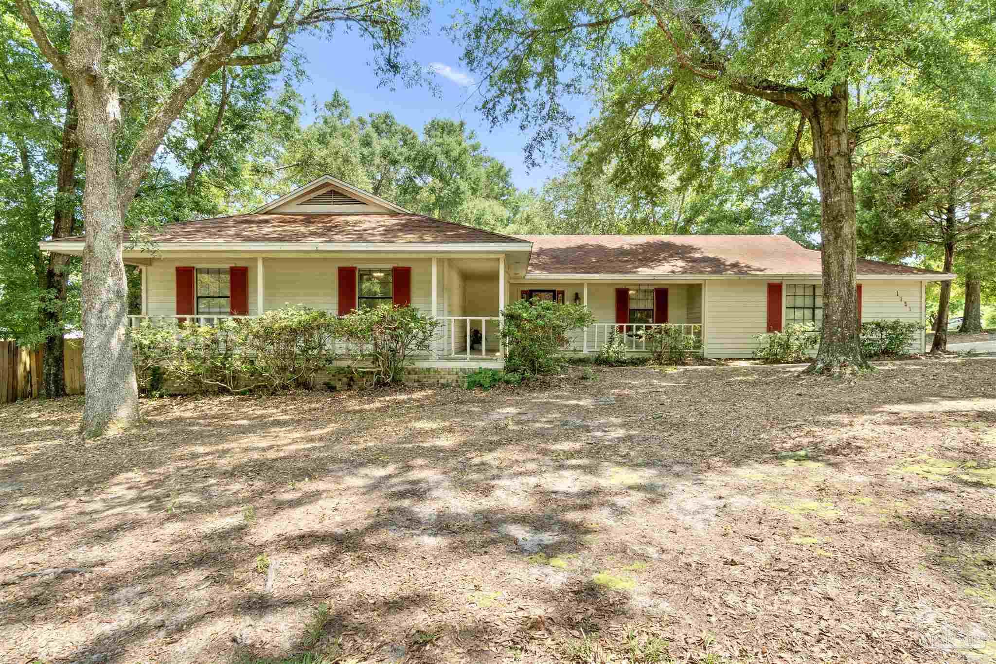 1151 Stone Bridge Road Pensacola, FL 32514 - Photo 8 of 52 front view of a house with a yard