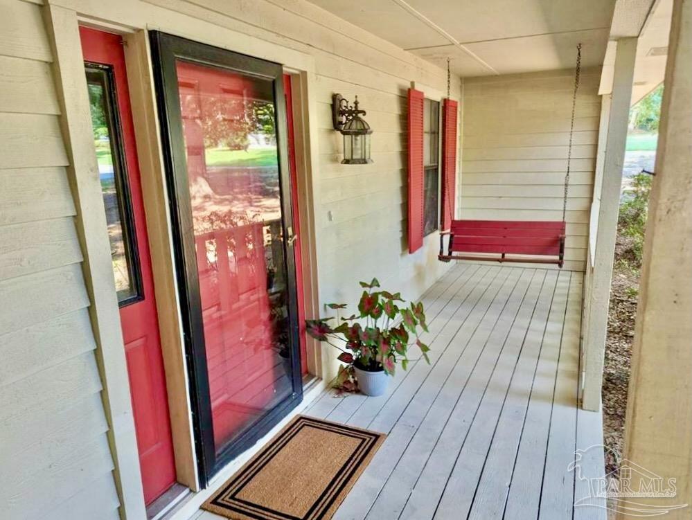 1151 Stone Bridge Road Pensacola, FL 32514 - Photo 9 of 52 an entryway with wooden floor
