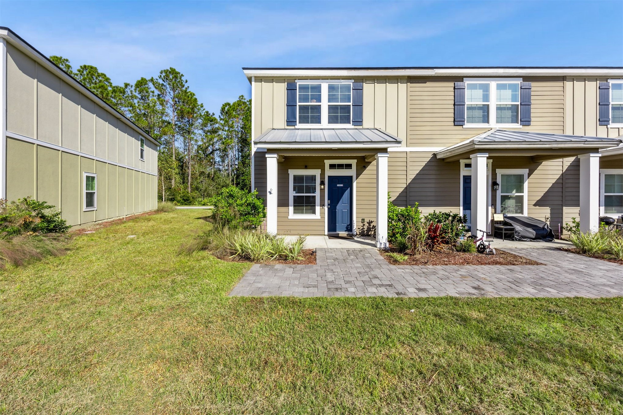 86440 Shortline Circle Yulee, FL 32097 - Photo 2 of 50 a front view of house with yard and green space
