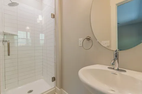 a bathroom with a bath tub with a sink