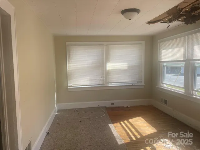 a view of a deck with a fence