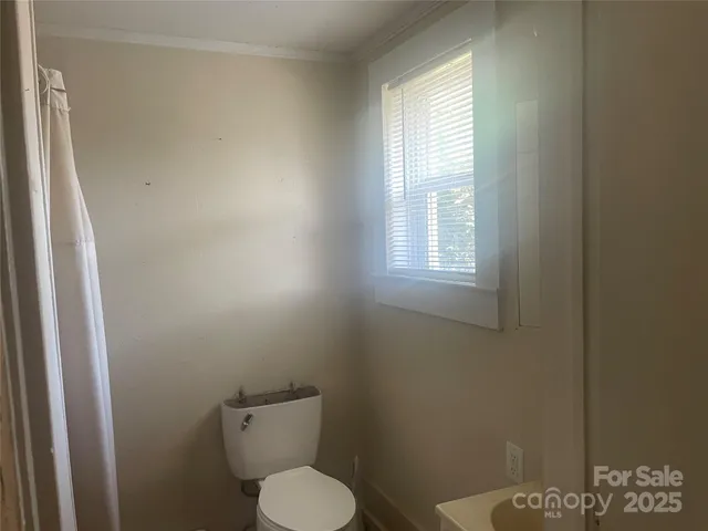 a bathroom with a sink and vanity