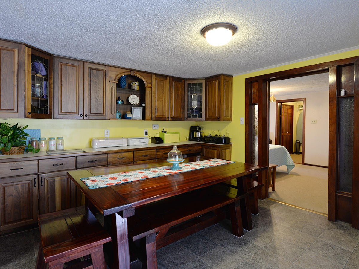 1743 Fairview Road Oliver Springs, TN 37840 - Photo 9 of 19 a kitchen with a table and chairs in it