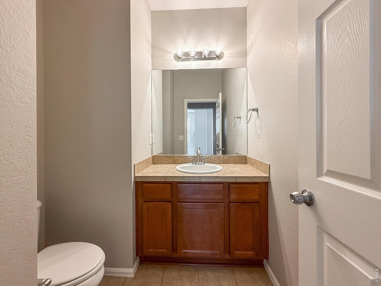6315 Spring Valley Road Timnath, CO 80547 - Photo 21 of 43 Powder Bath - Main Level