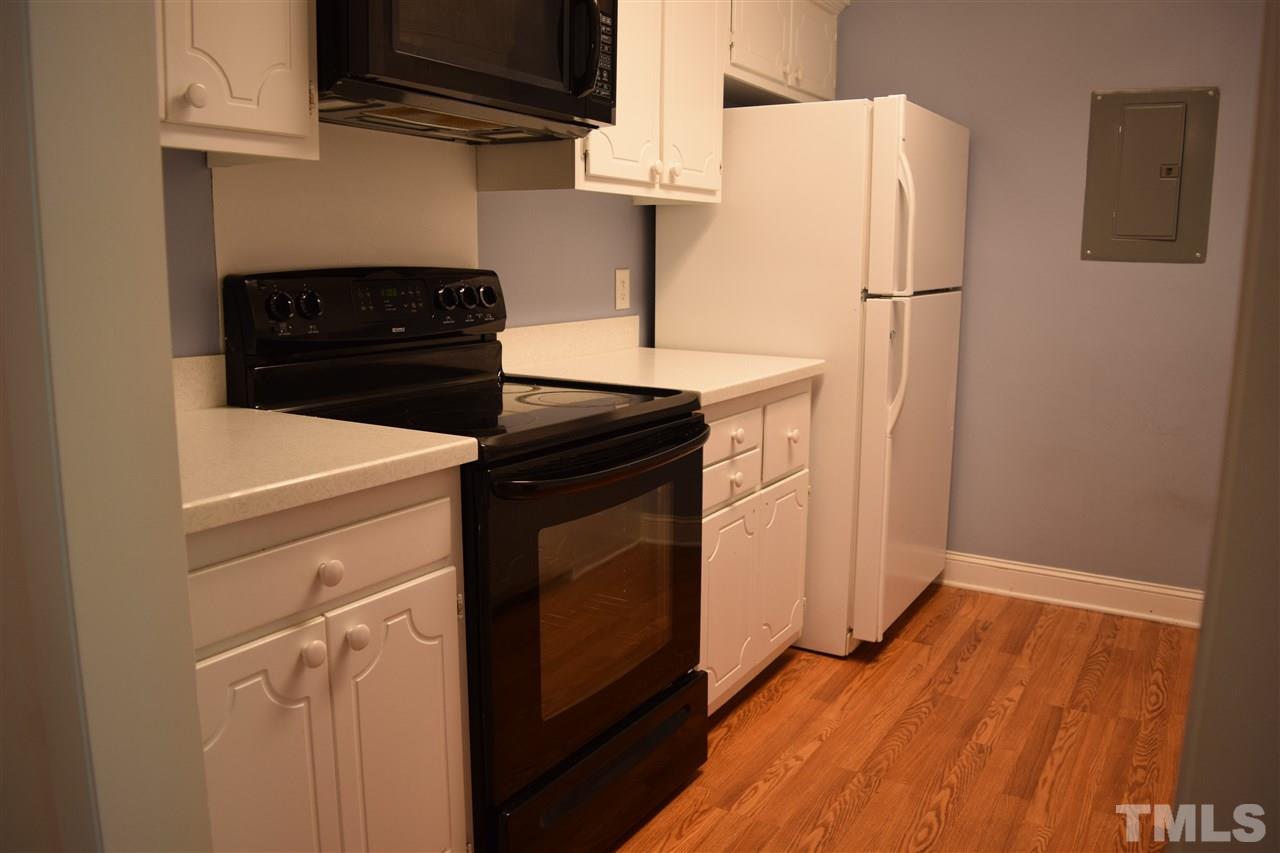 4519 Edwards Mill Road, Unit F Raleigh, NC 27612 - Photo 5 of 14 a utility room with dryer and washer