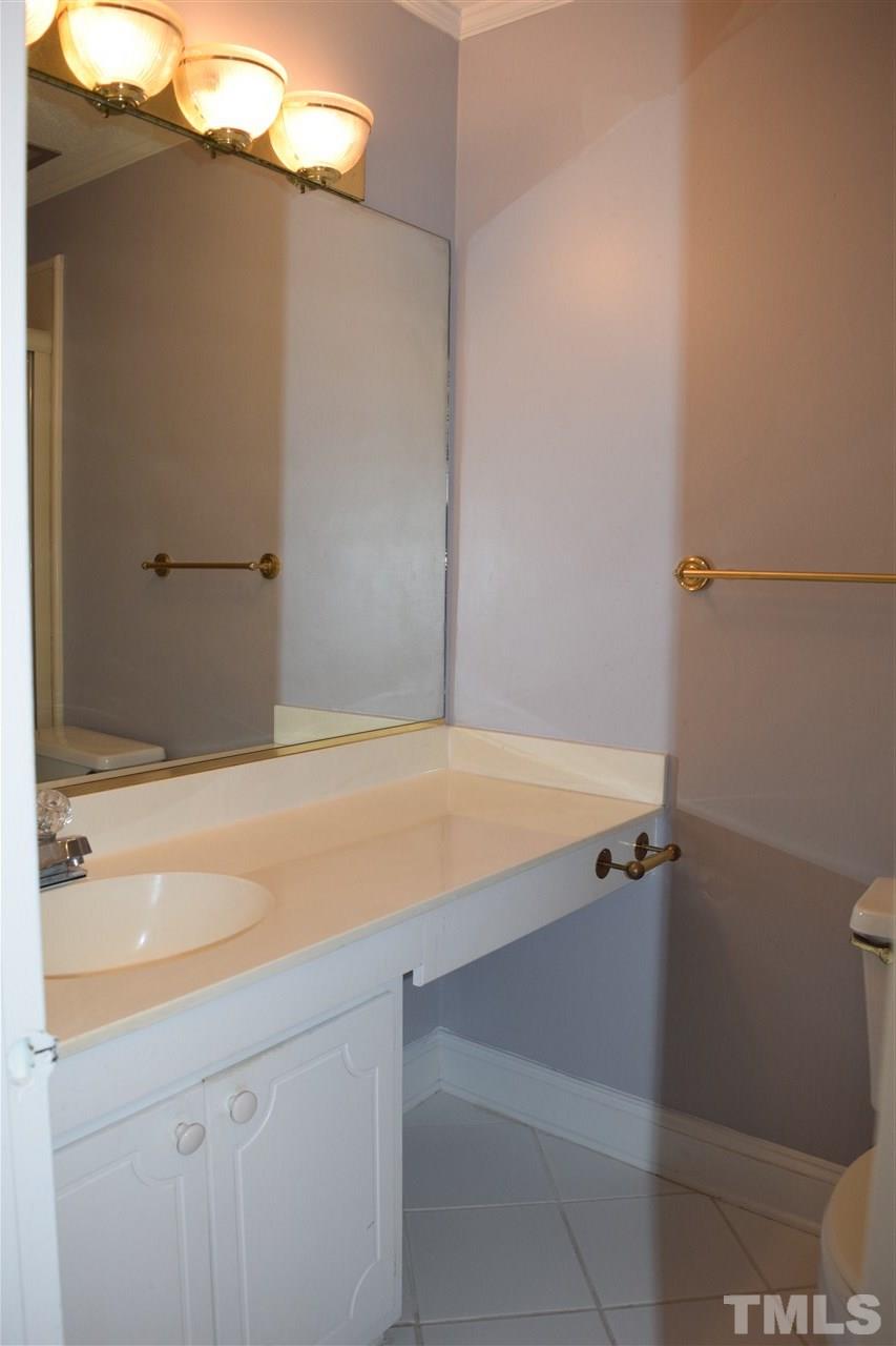 4519 Edwards Mill Road, Unit F Raleigh, NC 27612 - Photo 9 of 14 a bathroom with a bathtub and shower