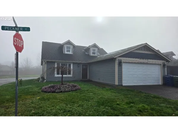 a black and white photo of a house