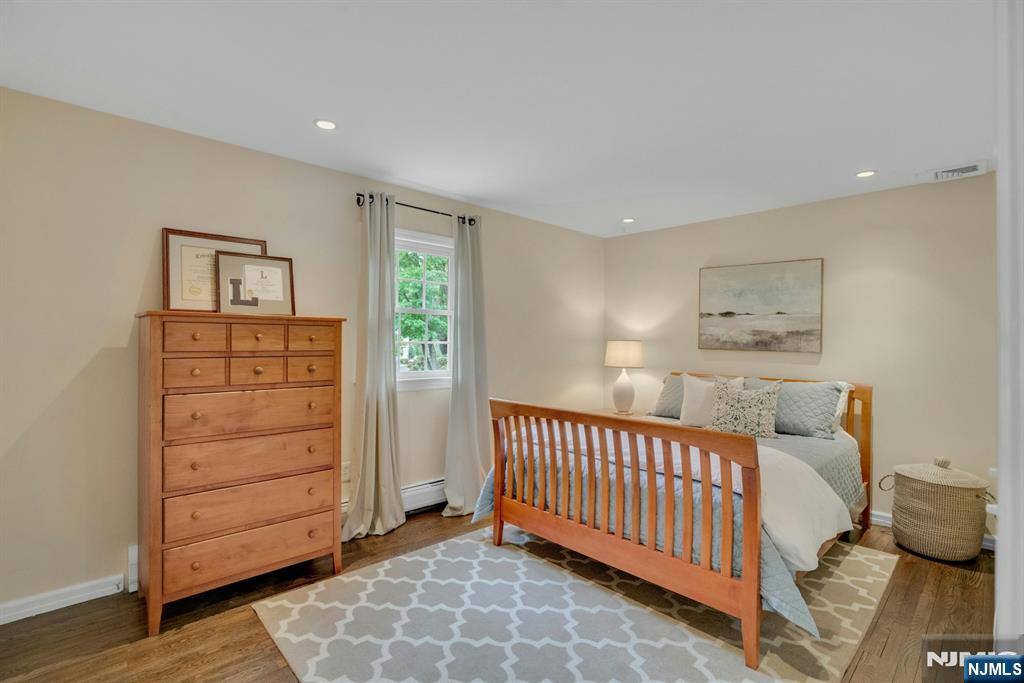 48 Hopper Farm Road Upper Saddle River, NJ 07458 - Photo 23 of 43 a view of a hallway with closet and cabinet