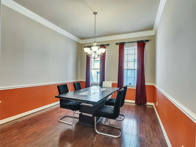 a dining room with furniture window wooden floor