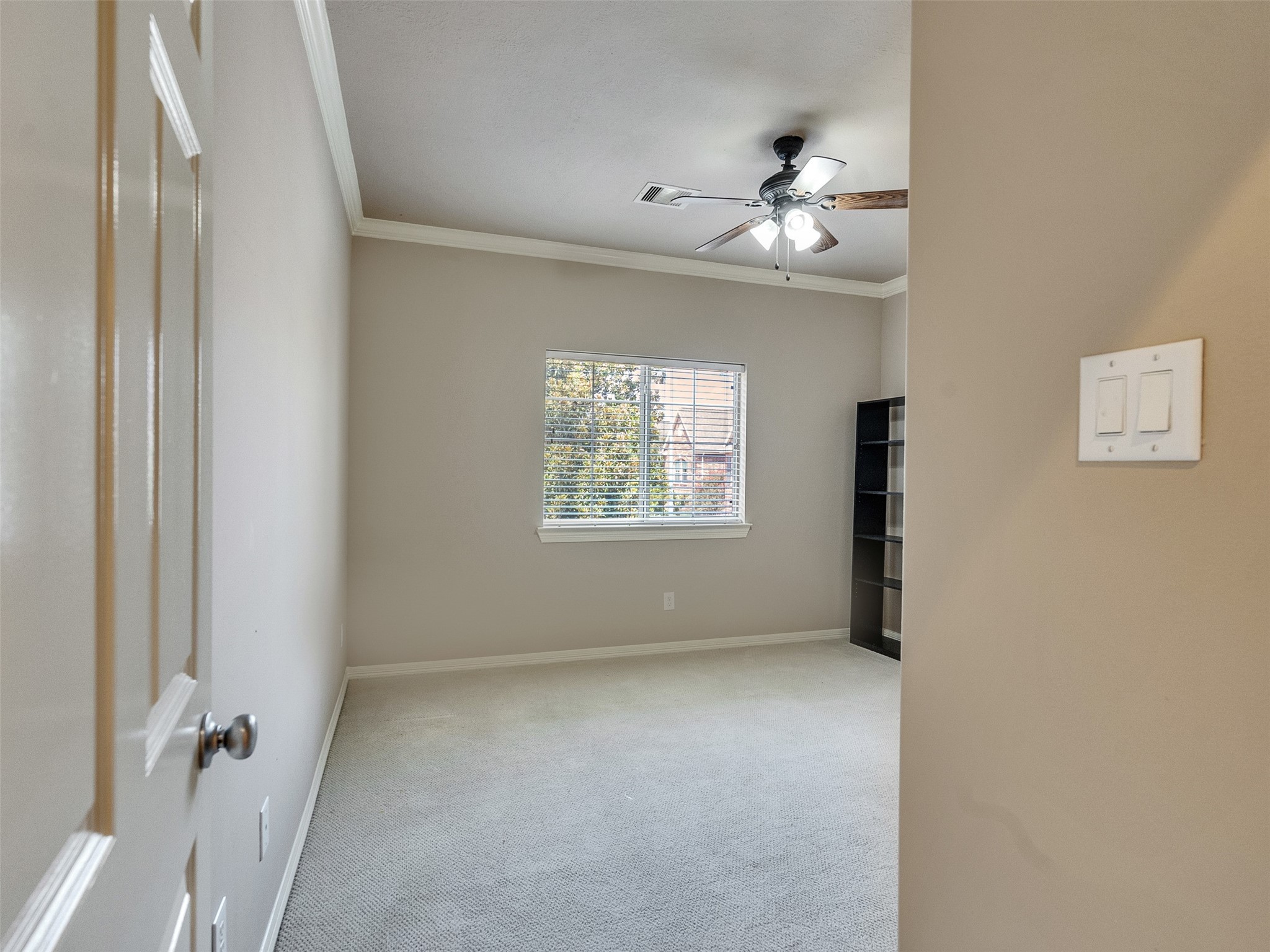 1502 Olive Place Houston, TX 77077 - Photo 27 of 35 a view of an empty room with a window