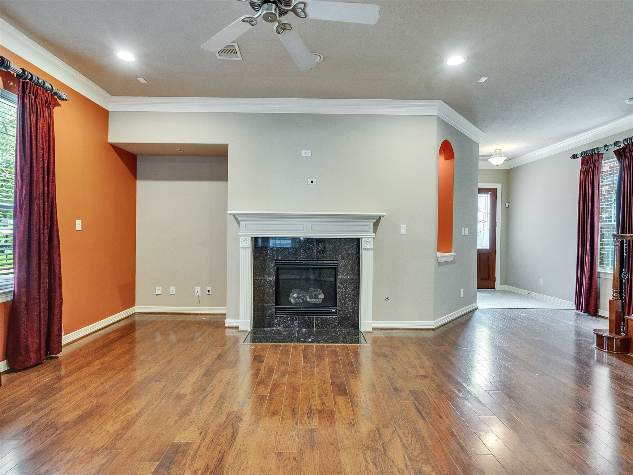 1502 Olive Place Houston, TX 77077 - Photo 6 of 35 wooden floor in an empty room with a window