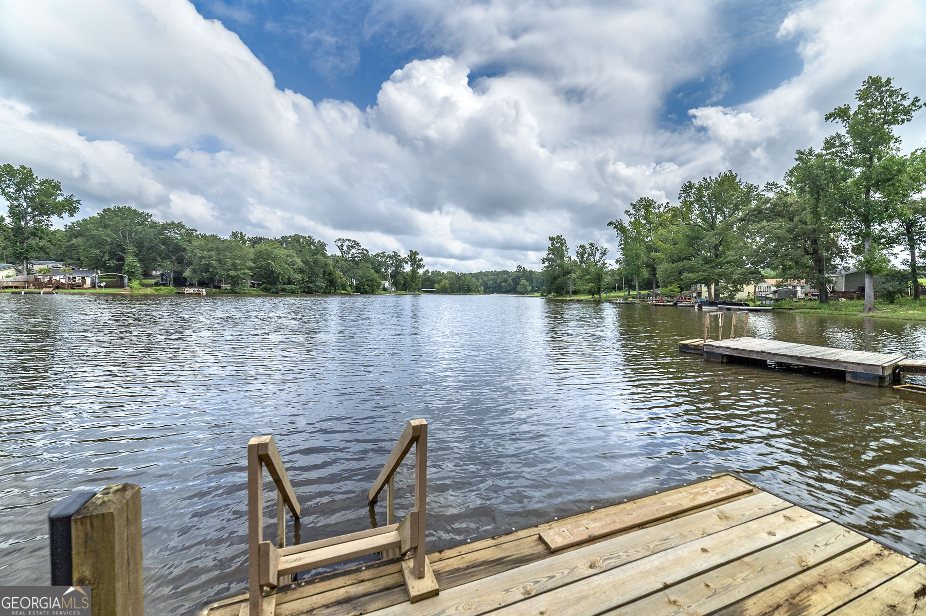 126 Elizabeth Circle Jackson, GA 30233 - Photo 11 of 33 a lake view with sitting space and garden