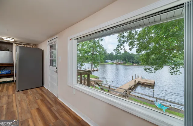 a sitting area with view of balcony