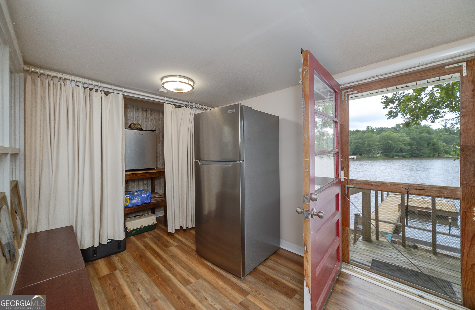 126 Elizabeth Circle Jackson, GA 30233 - Photo 19 of 33 a view of a hallway with wooden floor and entryway