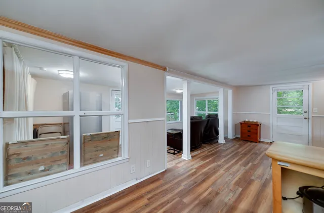a bedroom with furniture and windows