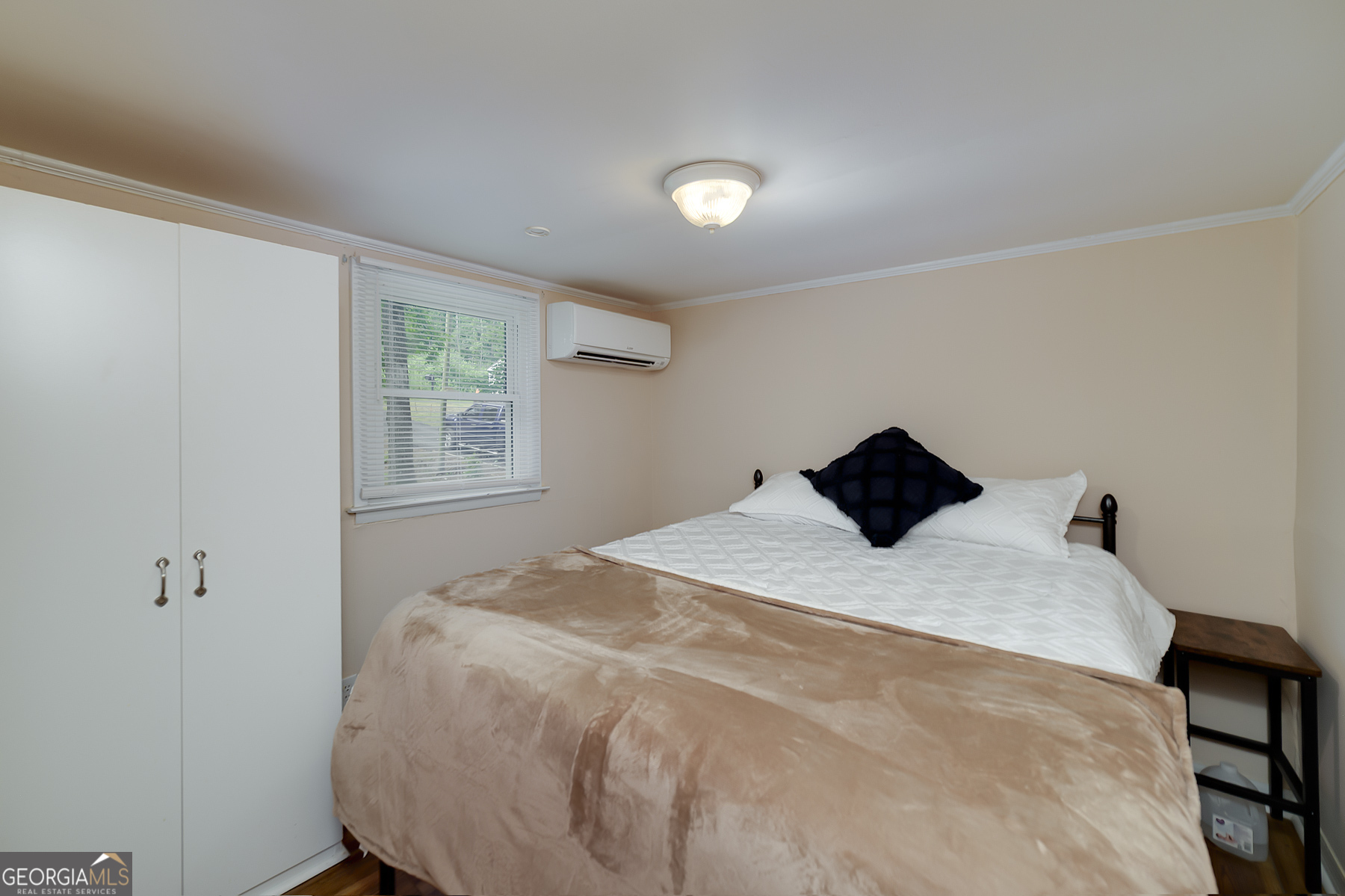 126 Elizabeth Circle Jackson, GA 30233 - Photo 25 of 33 a bedroom with a bed and a window