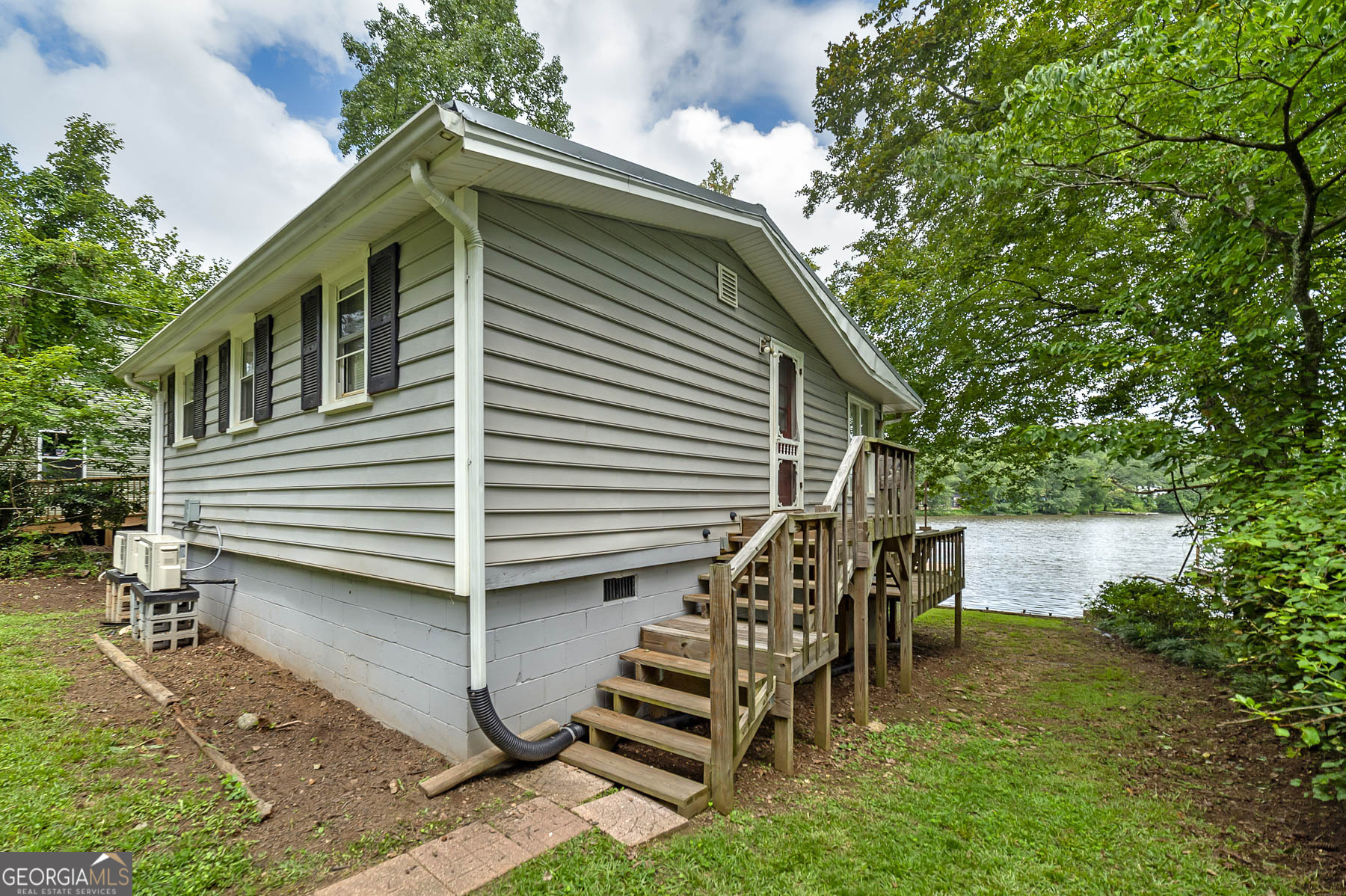 126 Elizabeth Circle Jackson, GA 30233 - Photo 32 of 33 a view of house with backyard and outdoor seating