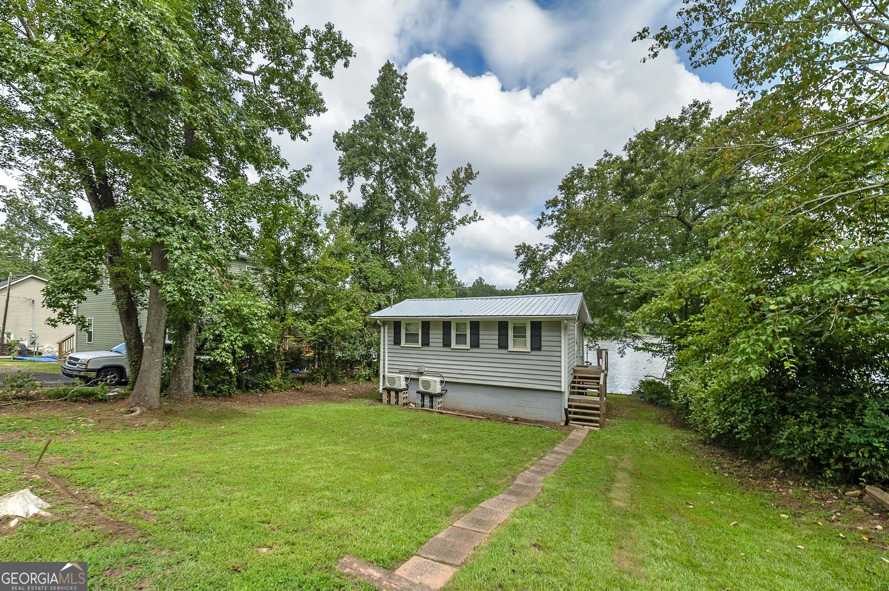 126 Elizabeth Circle Jackson, GA 30233 - Photo 33 of 33 a view of house with a yard