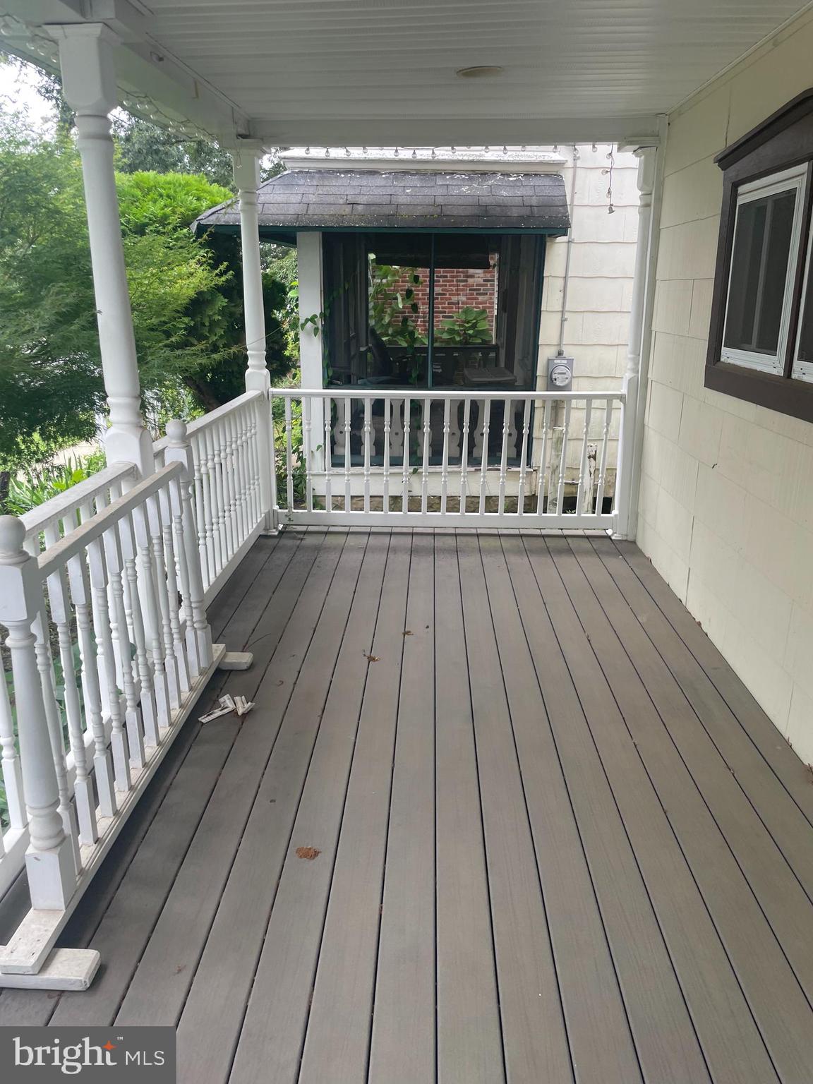 309 West Avenue Pitman, NJ 08071 - Photo 2 of 12 a view of deck with a large window