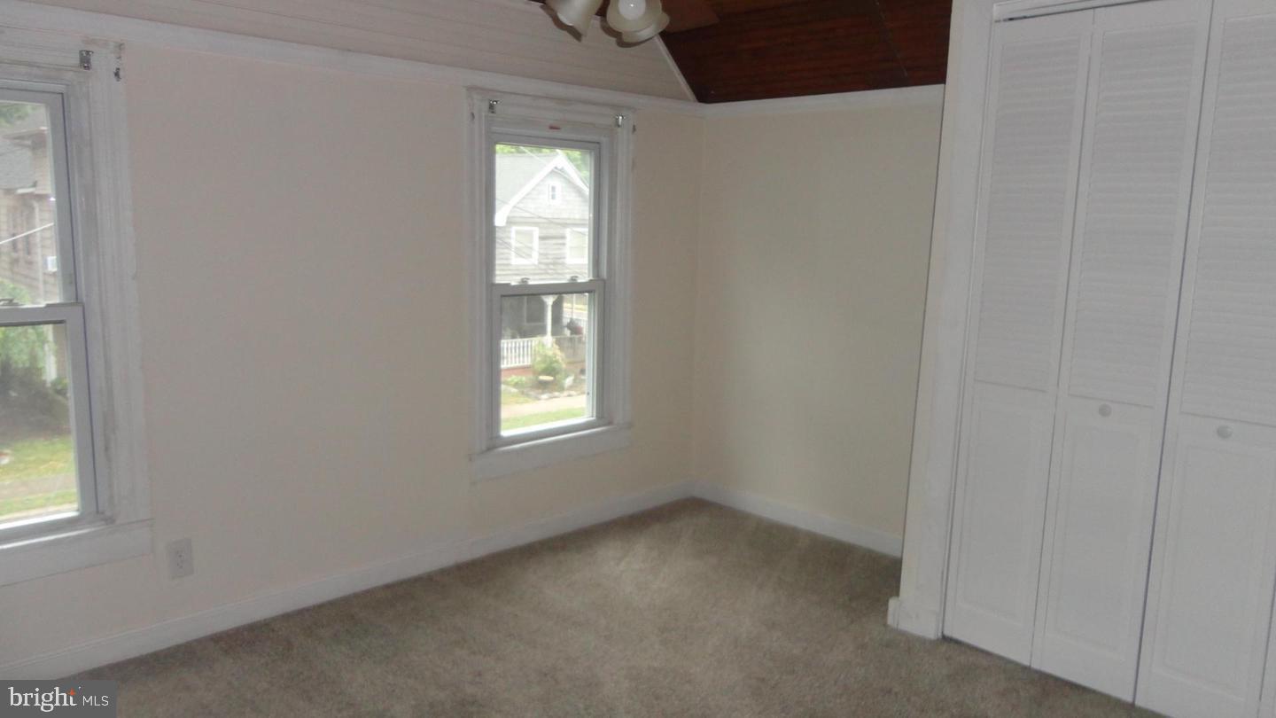 309 West Avenue Pitman, NJ 08071 - Photo 9 of 12 a view of an empty room and a window
