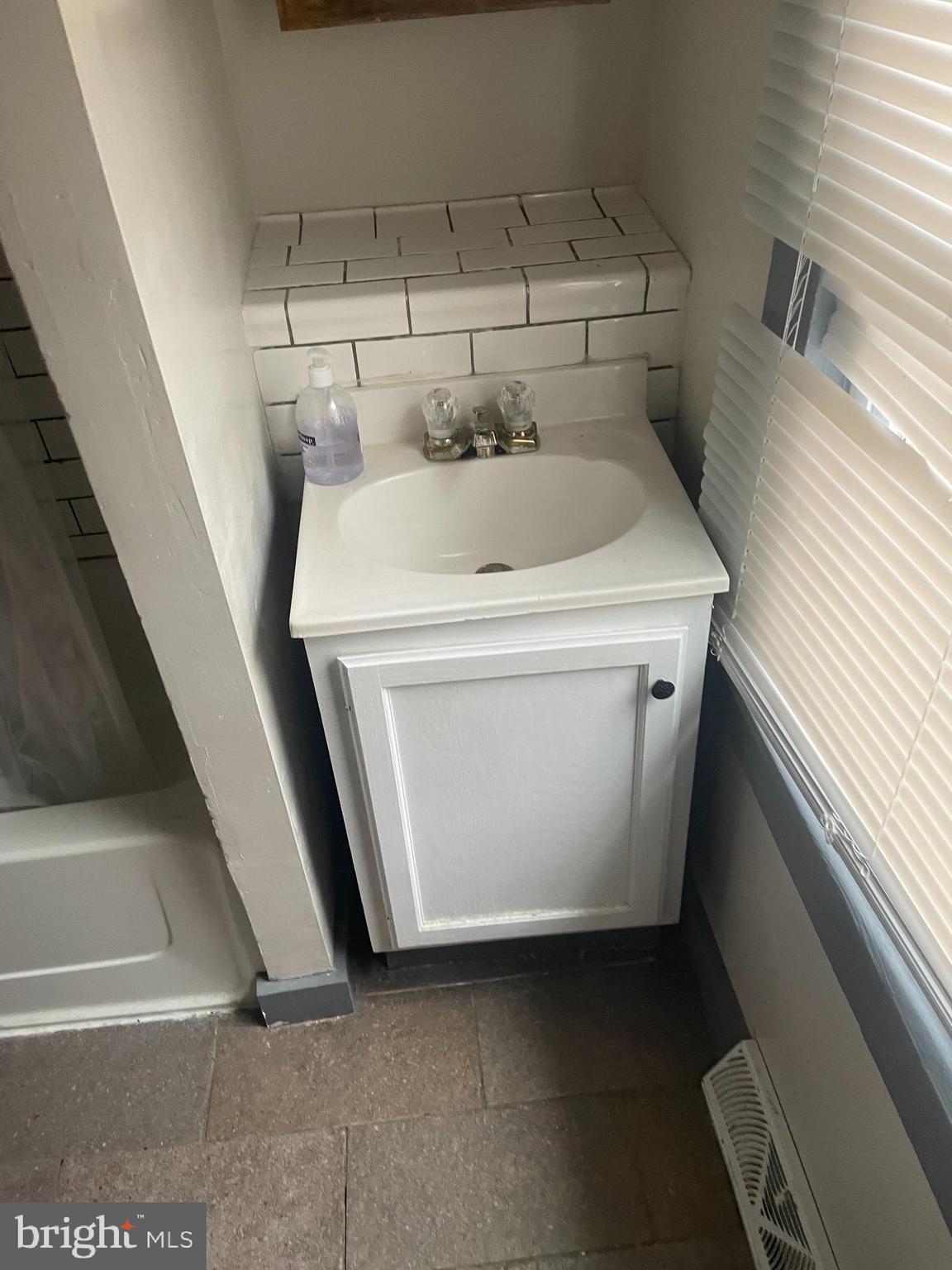 309 West Avenue Pitman, NJ 08071 - Photo 10 of 12 a utility room with dryer and washer