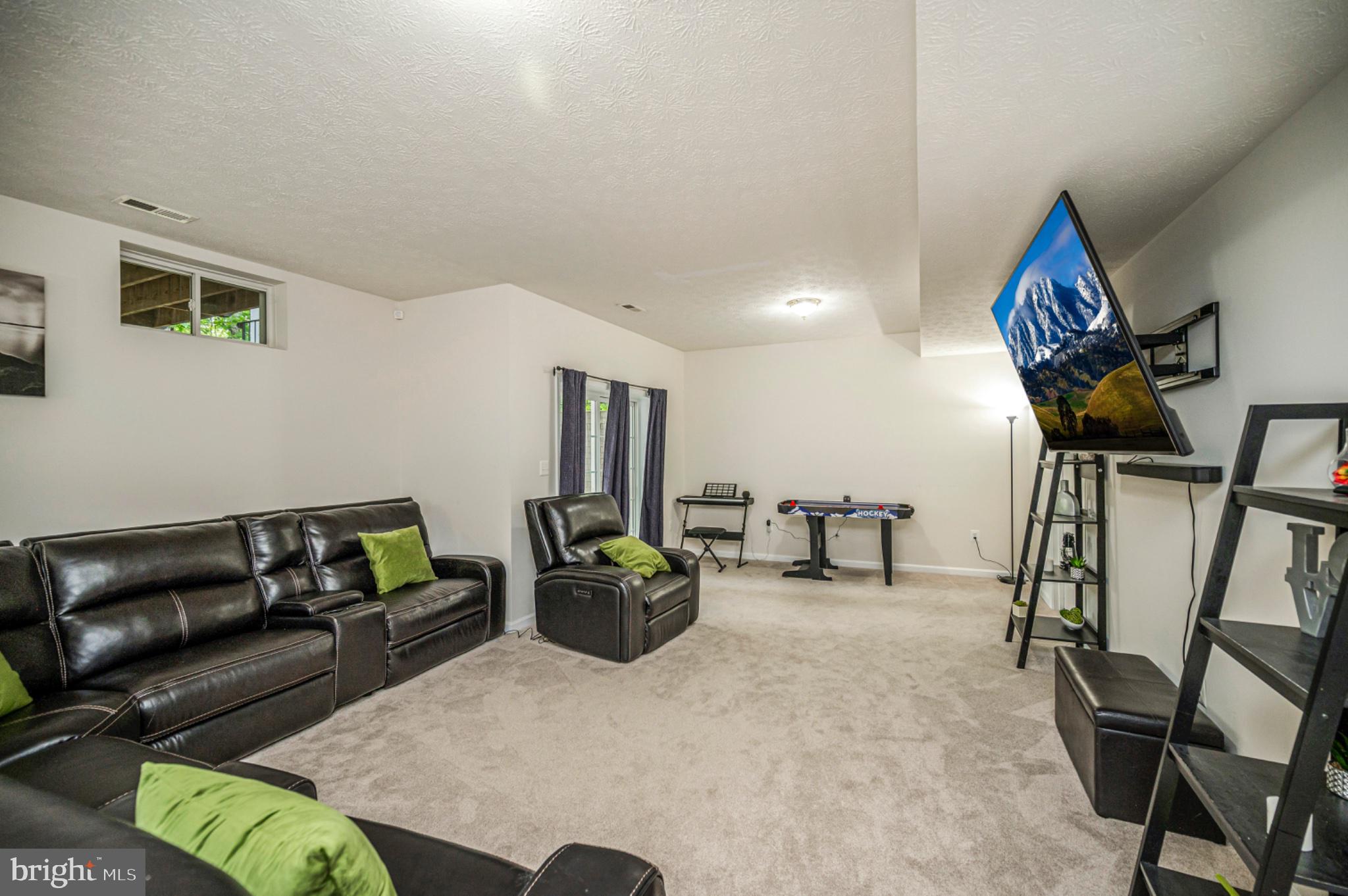 239 Toluca Road Stafford, VA 22556 - Photo 71 of 75 Spacious, inviting entertainment area.
