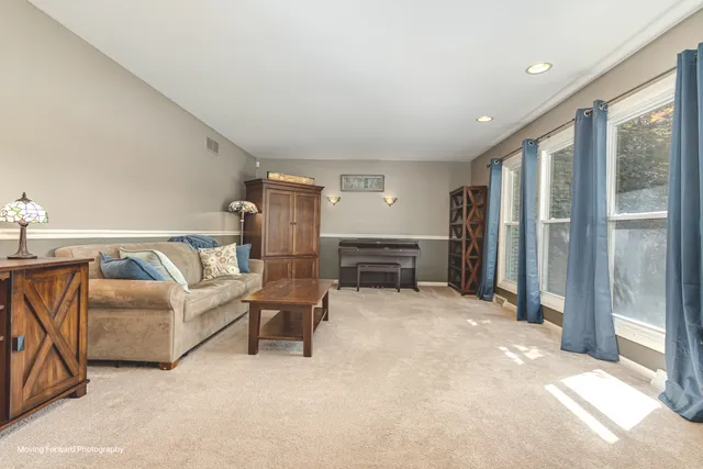 a view of livingroom with furniture and staircase