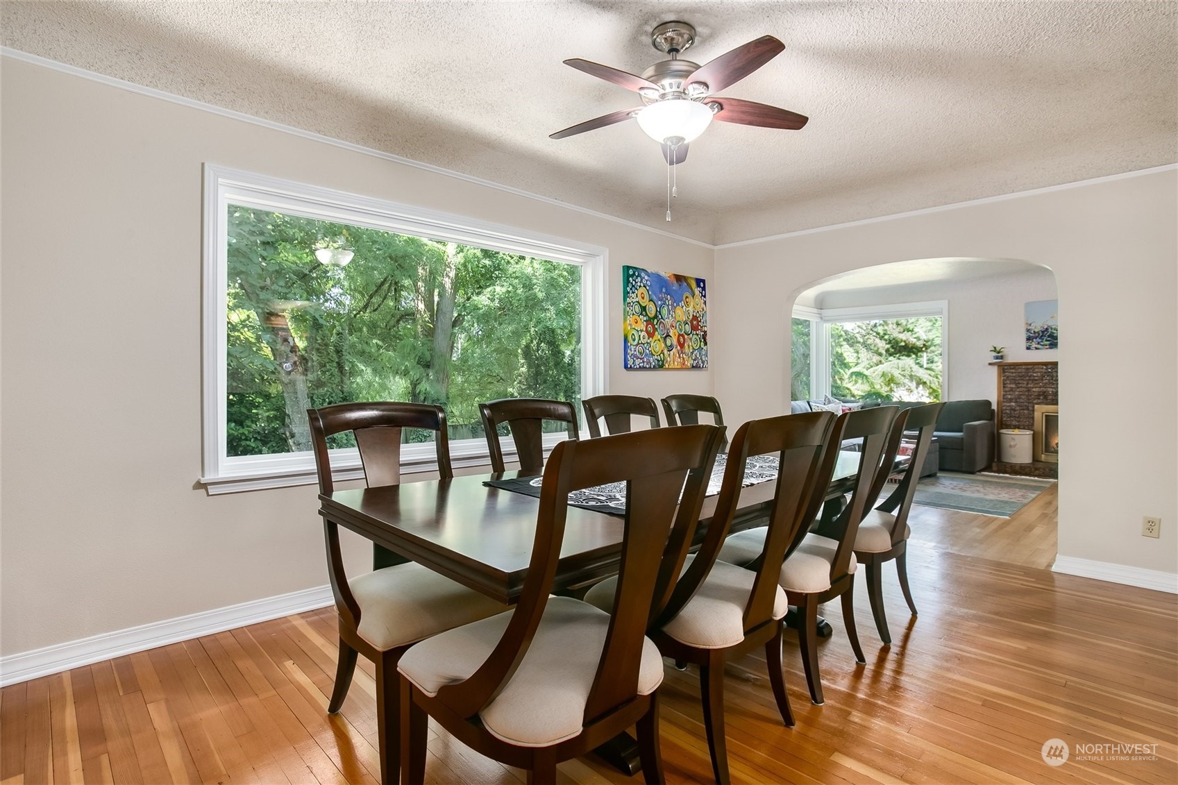1124 Southwest Sunset Boulevard Renton, WA 98057 - Photo 7 of 36 a view of a dining room with furniture window and wooden floor