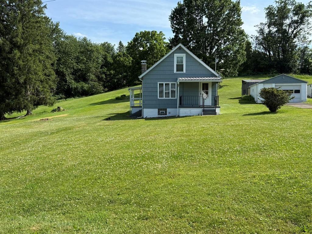 222 Bagdad Road Leechburg, PA 15656 - Photo 2 of 23 a front view of a house with garden