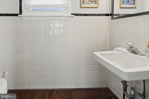 a bathroom with a sink and shower