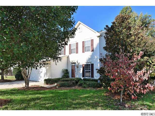 608 Eaton Court Fort Mill, SC 29708 - Photo 1 of 16 a front view of house with a garden