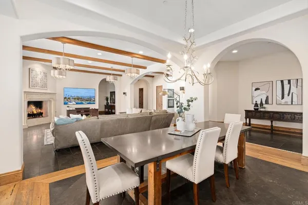 a living room with furniture fireplace and a fireplace
