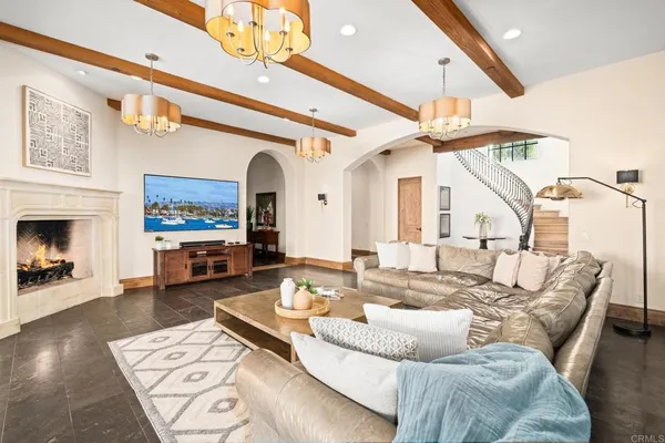 a view of a livingroom with furniture and a window