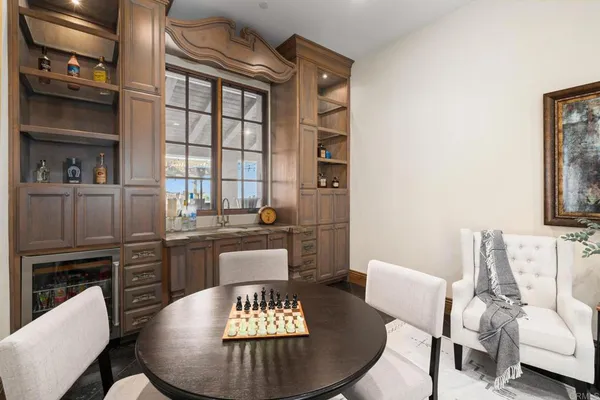 a living room with furniture and a rug