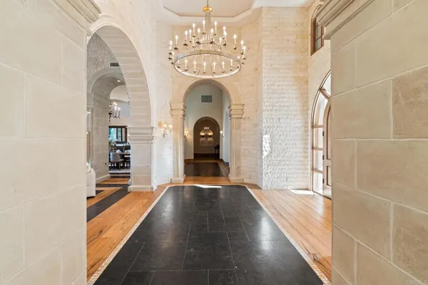 a view of a swimming pool with lounge chairs
